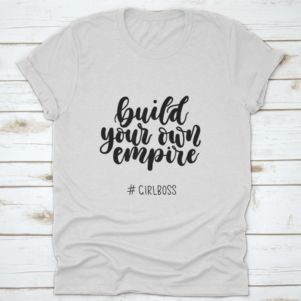 A stylish Girlboss Inspirational Quote T-Shirt made from 100% cotton, featuring a motivational design perfect for aspiring entrepreneurs.