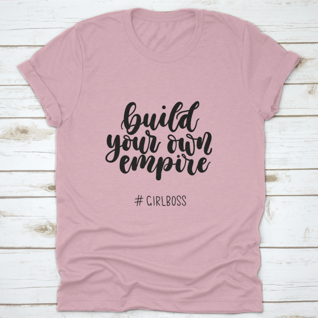 A stylish Girlboss Inspirational Quote T-Shirt made from 100% cotton, featuring a motivational design perfect for aspiring entrepreneurs.