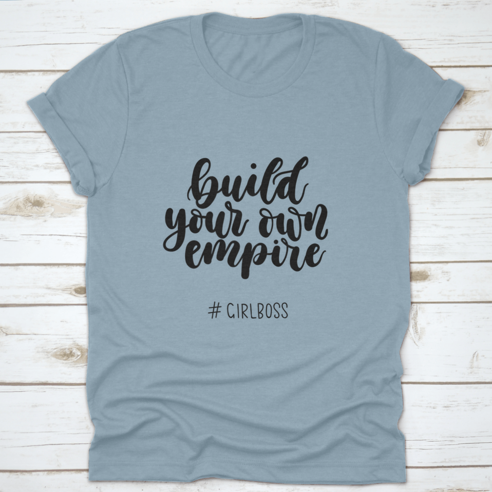 A stylish Girlboss Inspirational Quote T-Shirt made from 100% cotton, featuring a motivational design perfect for aspiring entrepreneurs.