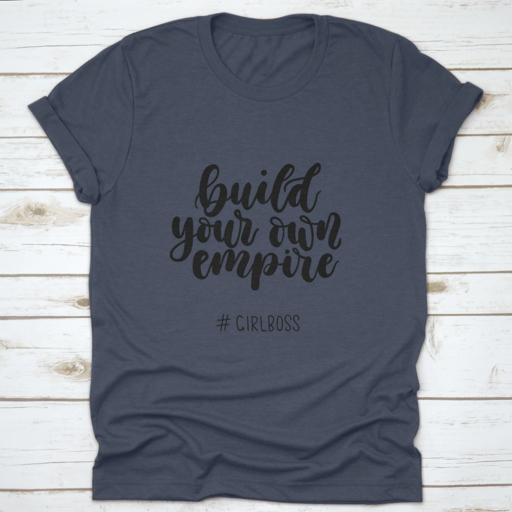A stylish Girlboss Inspirational Quote T-Shirt made from 100% cotton, featuring a motivational design perfect for aspiring entrepreneurs.