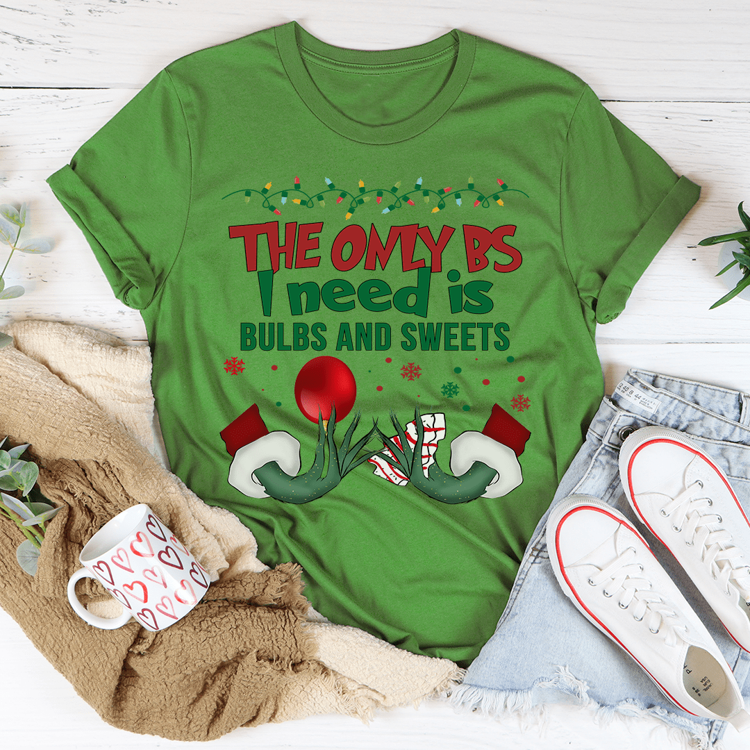 A festive Bulbs And Sweets Tee featuring a colorful holiday design, made from 100% soft cotton, perfect for Christmas celebrations.