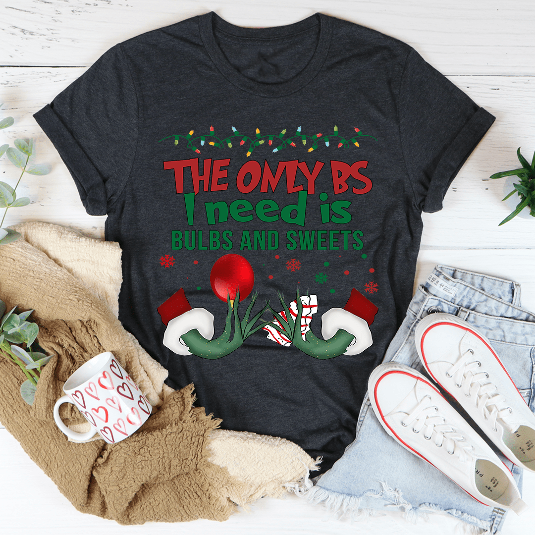 A festive Bulbs And Sweets Tee featuring a colorful holiday design, made from 100% soft cotton, perfect for Christmas celebrations.