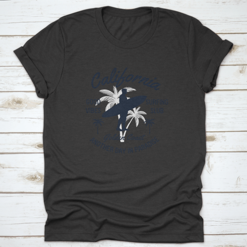 California Text T-shirt featuring surfer and palm tree vector illustrations, showcasing a vibrant beach lifestyle.