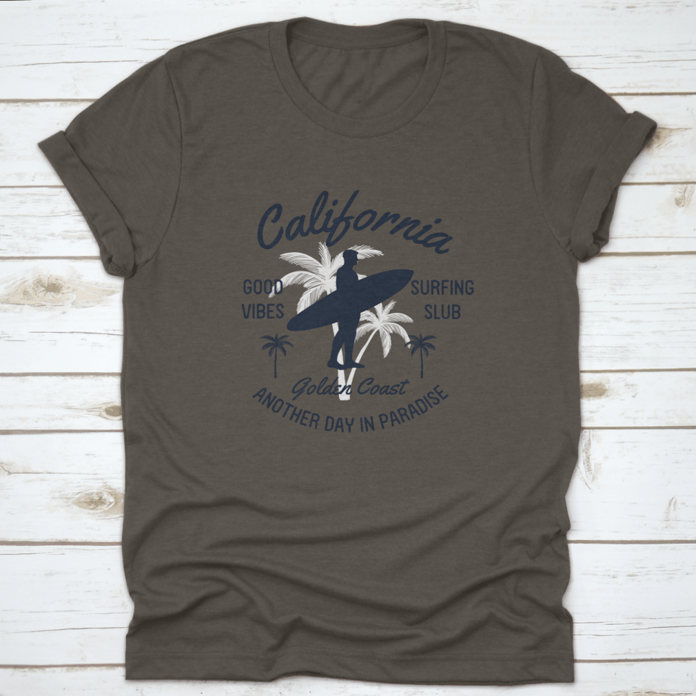 California Text T-shirt featuring surfer and palm tree vector illustrations, showcasing a vibrant beach lifestyle.