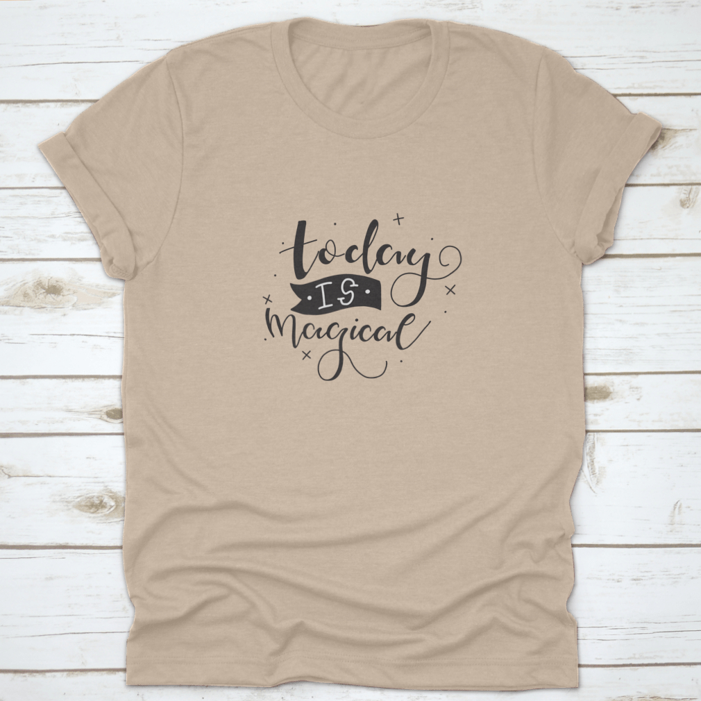 A stylish t-shirt featuring a hand-drawn calligraphic motivational quote design, made from soft cotton fabric.