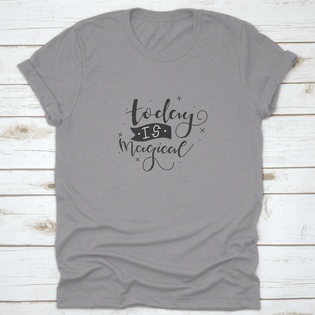 A stylish t-shirt featuring a hand-drawn calligraphic motivational quote design, made from soft cotton fabric.