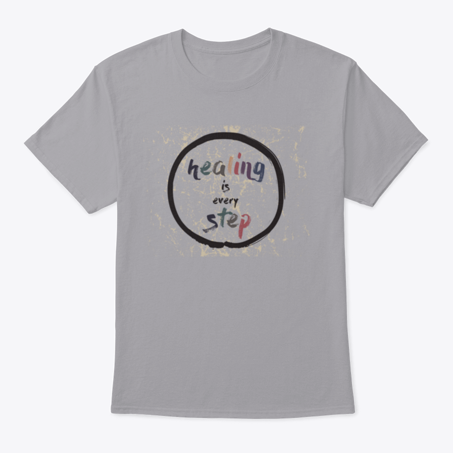 A soft cotton t-shirt featuring the inspirational quote 'Healing Is Every Step' in elegant calligraphy, perfect for casual wear.