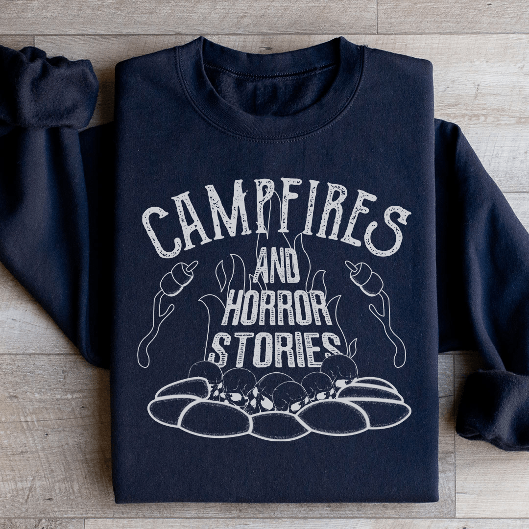 Cozy Campfires & Horror Stories sweatshirt featuring a unique design, perfect for chilly nights and storytelling.