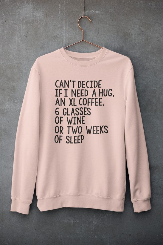 Cozy sweatshirt featuring a playful design with the phrase 'Can't Decide If I Need A Hug An XL Coffee 6 Glasses Of Wine', made from soft fleece material.