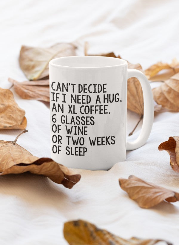 A stylish 11oz ceramic mug with a humorous design that reads 'Can't Decide If I Need A Hug'. Features a sturdy handle and glossy finish.