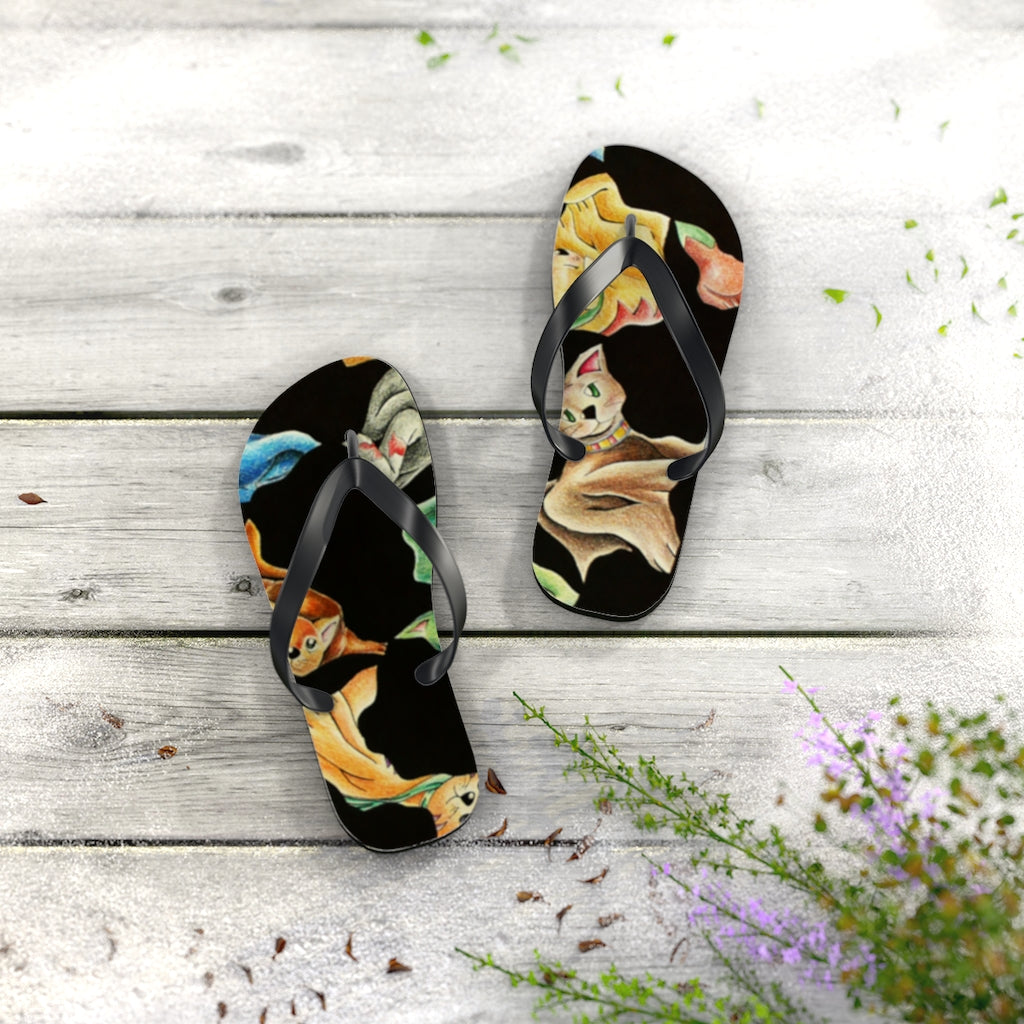 A pair of Cat Pattern Flip Flops featuring a vibrant cat design, cushioned footbed, and black PVC strap, perfect for summer wear.