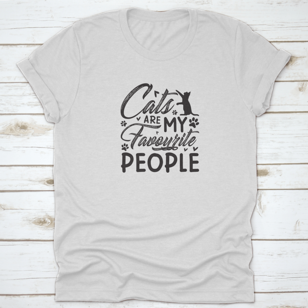A humorous t-shirt featuring the text 'Cats Are My Favorite People' with a paw graphic, made from soft cotton fabric.