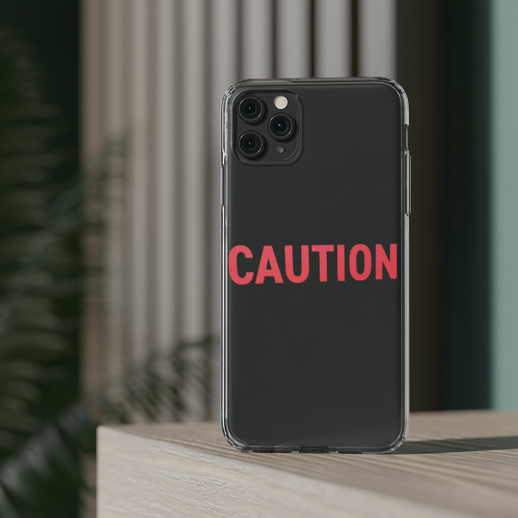 Caution Clear Case showcasing a crystal clear design with cushioned TPU edges, protecting a smartphone.