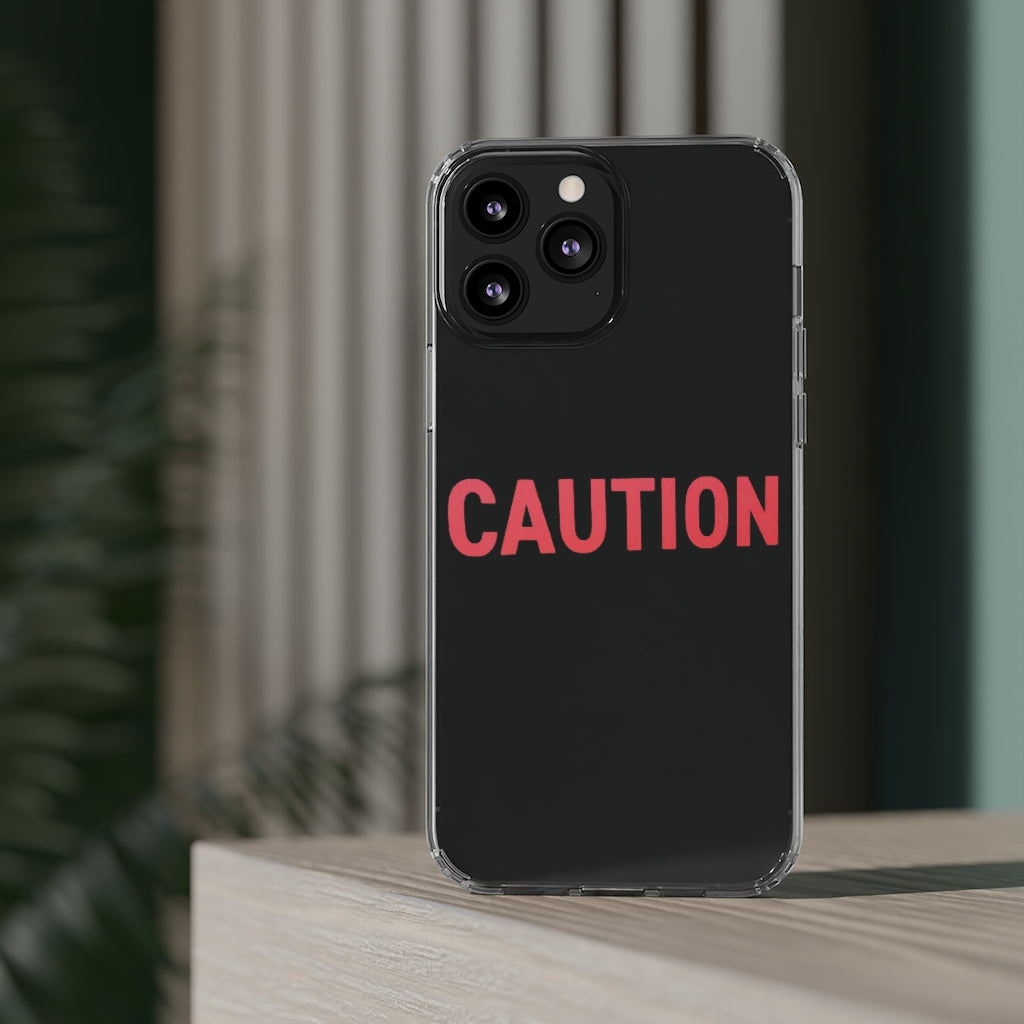 Caution Clear Case showcasing a crystal clear design with cushioned TPU edges, protecting a smartphone.