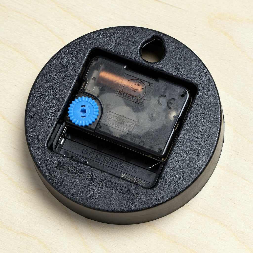 CG Frog Wooden Wall Clock made from sustainable birch plywood, featuring a unique design and available in two sizes.