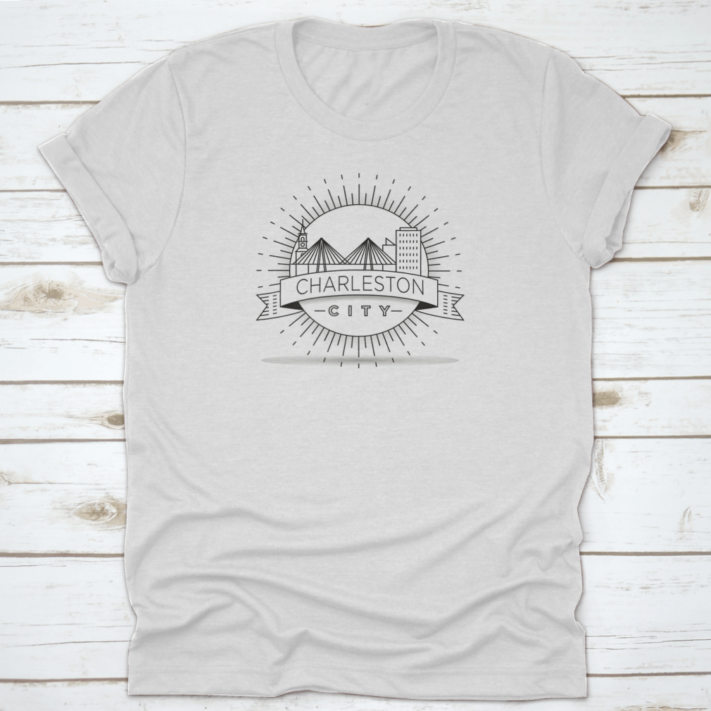 Charleston Linear City Skyline t-shirt featuring a round sun and black accents, made from 100% cotton for comfort.