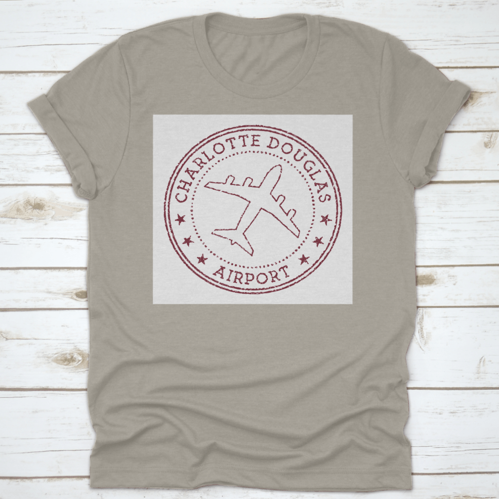 Charlotte Douglas Airport Stamp logo t-shirt in grey, showcasing a round logo design.