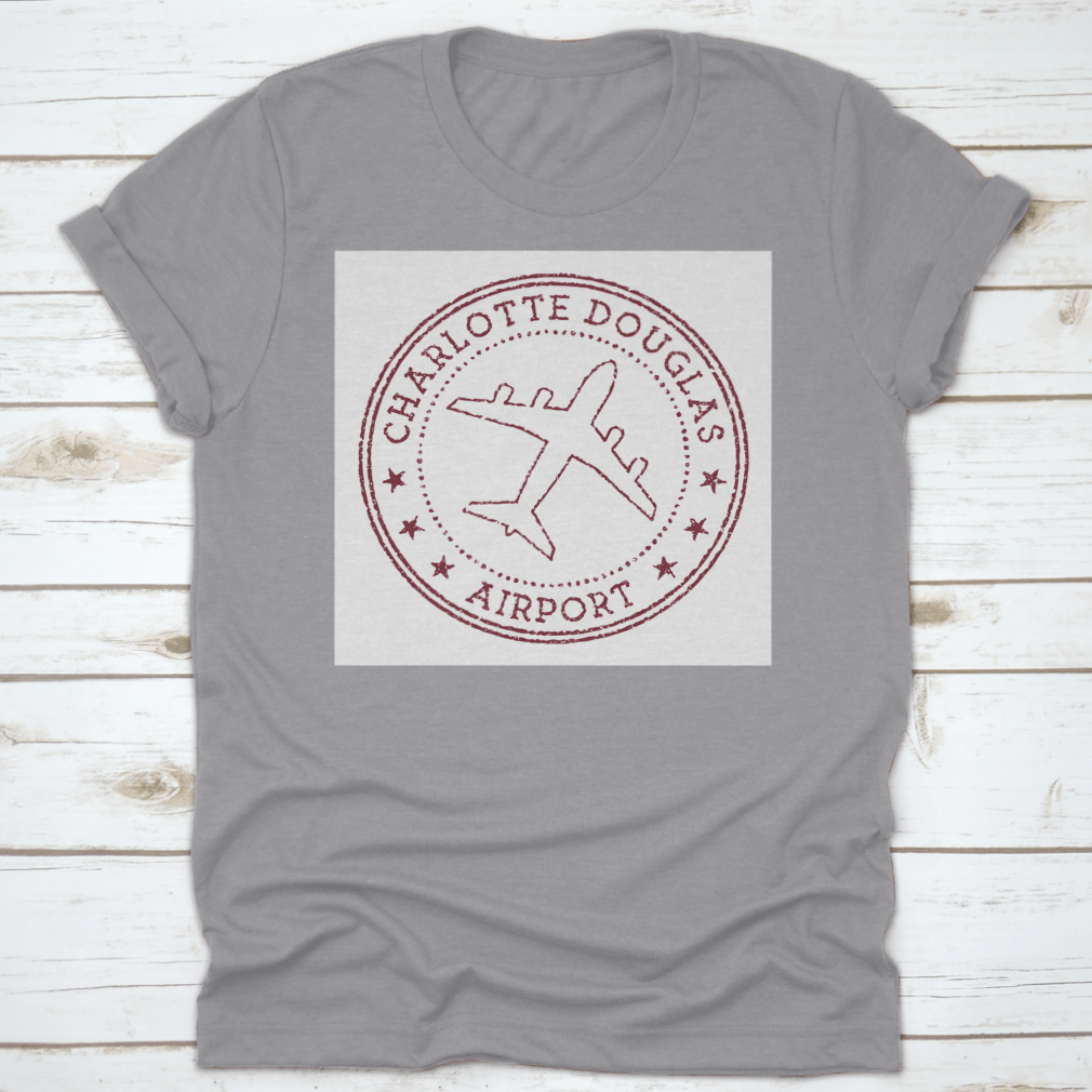 Charlotte Douglas Airport Stamp logo t-shirt in grey, showcasing a round logo design.