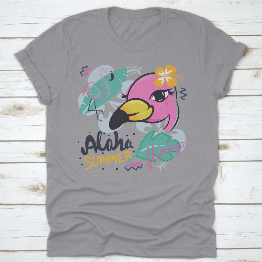 A charming pink flamingo cartoon design on a girl's t-shirt with tropical elements, showcasing vibrant colors and playful graphics.