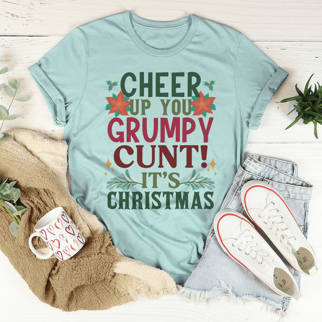 A festive Cheer Up It's Christmas Tee featuring a vibrant holiday-themed design, made from 100% soft cotton, perfect for celebrating the season.