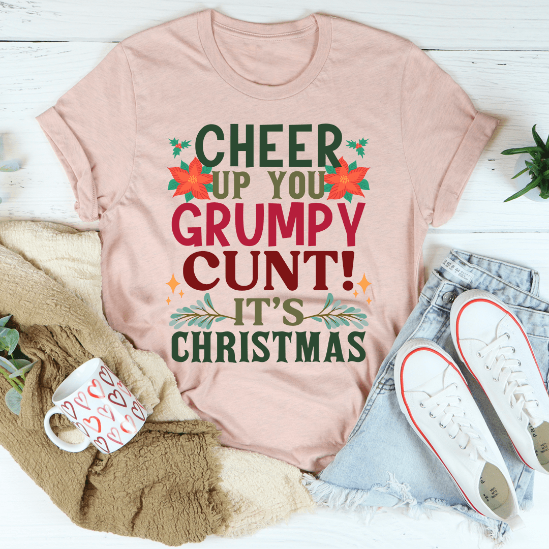 A festive Cheer Up It's Christmas Tee featuring a vibrant holiday-themed design, made from 100% soft cotton, perfect for celebrating the season.