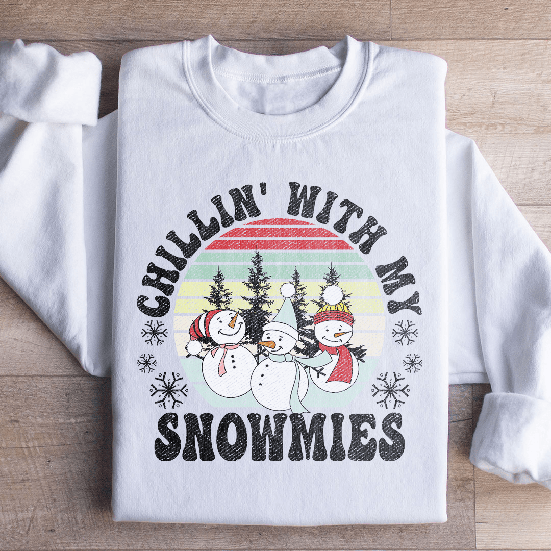 Chillin' With My Snowmies Sweatshirt featuring a festive design with snowmen, made from 100% soft cotton, perfect for holiday celebrations.