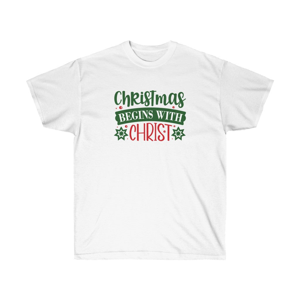 A festive unisex t-shirt featuring the phrase 'Christmas Begins with Christ', perfect for holiday celebrations.