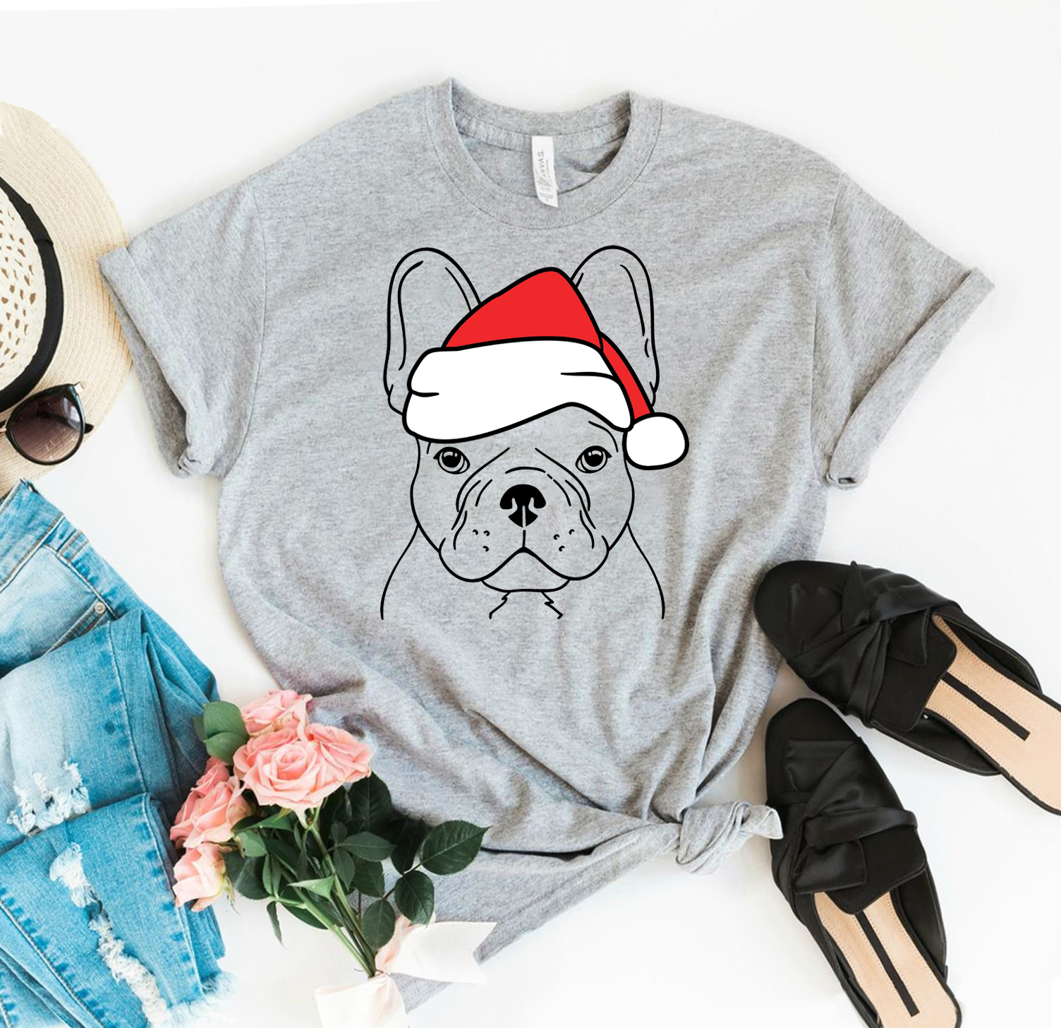 A festive Christmas Bulldog T-shirt featuring a cheerful bulldog graphic, made from premium ring spun cotton.