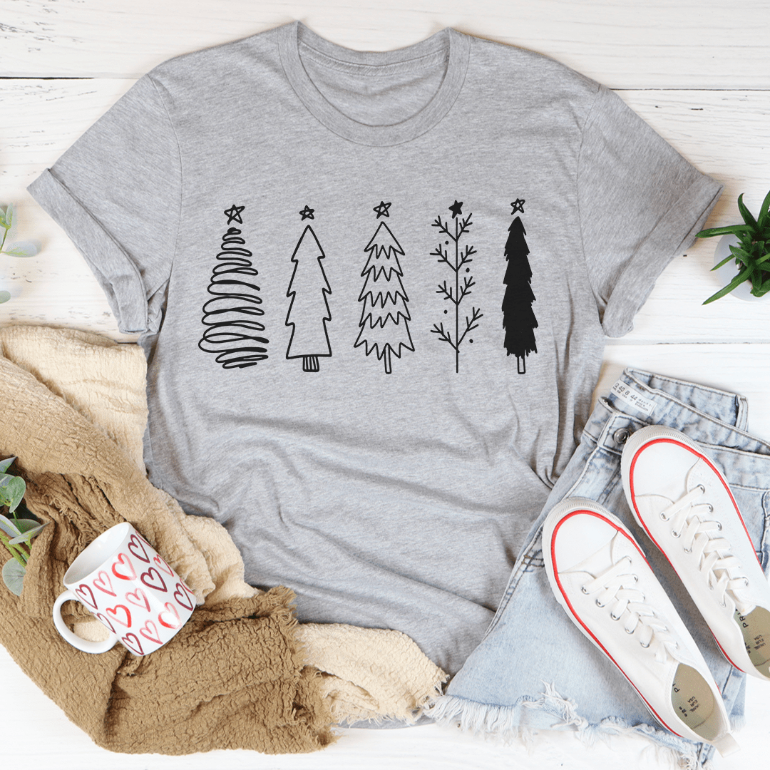 A festive Christmas Trees Tee featuring vibrant digitally printed Christmas tree designs on a soft cotton fabric, perfect for holiday celebrations.