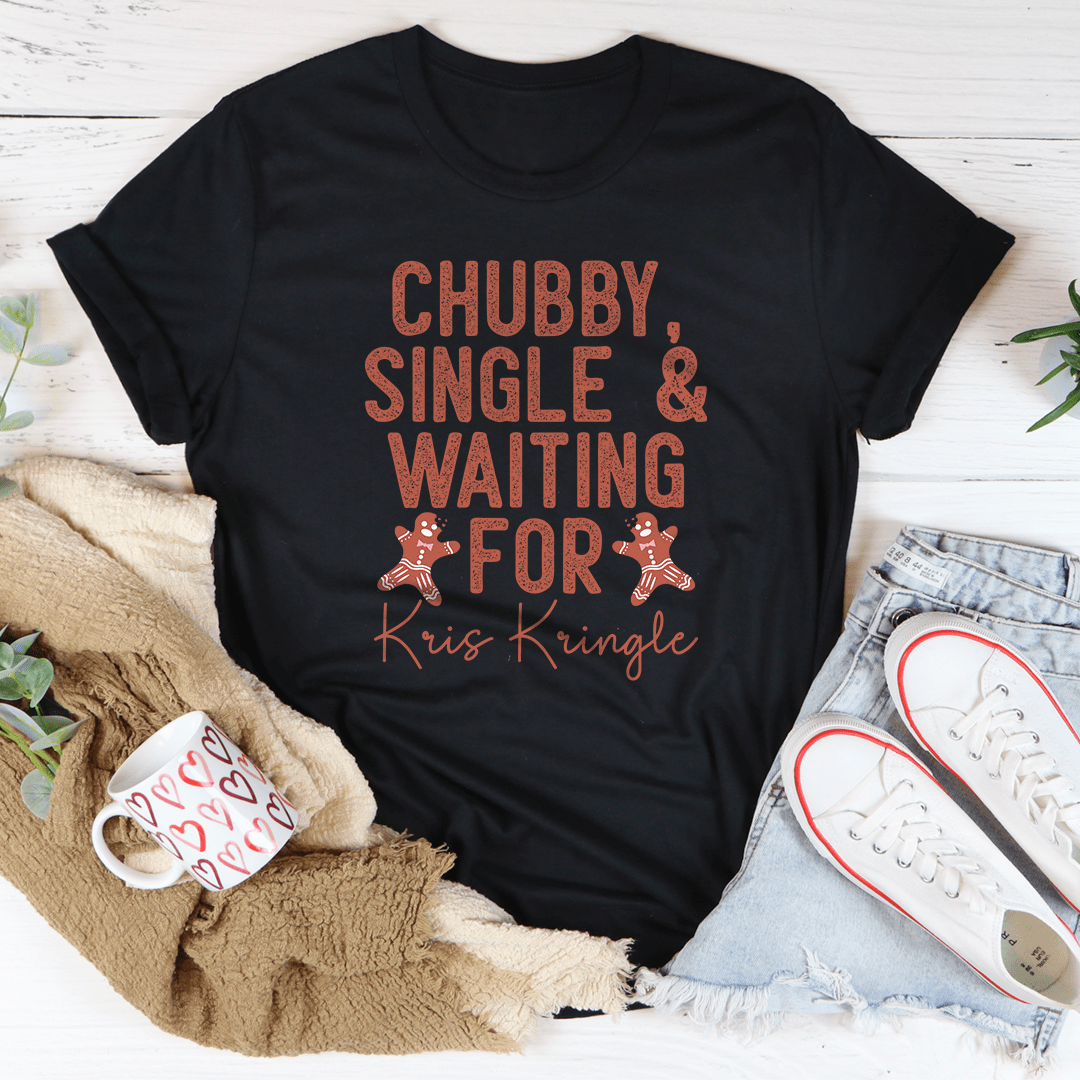 Chubby Single & Waiting For Kris Kringle Tee featuring a festive design, made from 100% soft cotton, perfect for holiday celebrations.