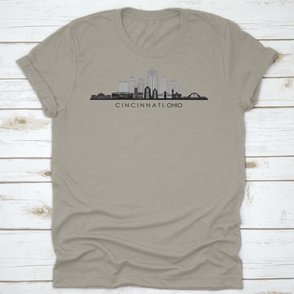 A modern t-shirt featuring the skyline silhouette of Cincinnati, Ohio, showcasing iconic buildings in a stylish design.