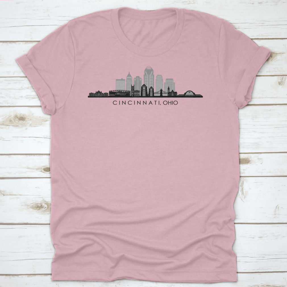 A modern t-shirt featuring the skyline silhouette of Cincinnati, Ohio, showcasing iconic buildings in a stylish design.