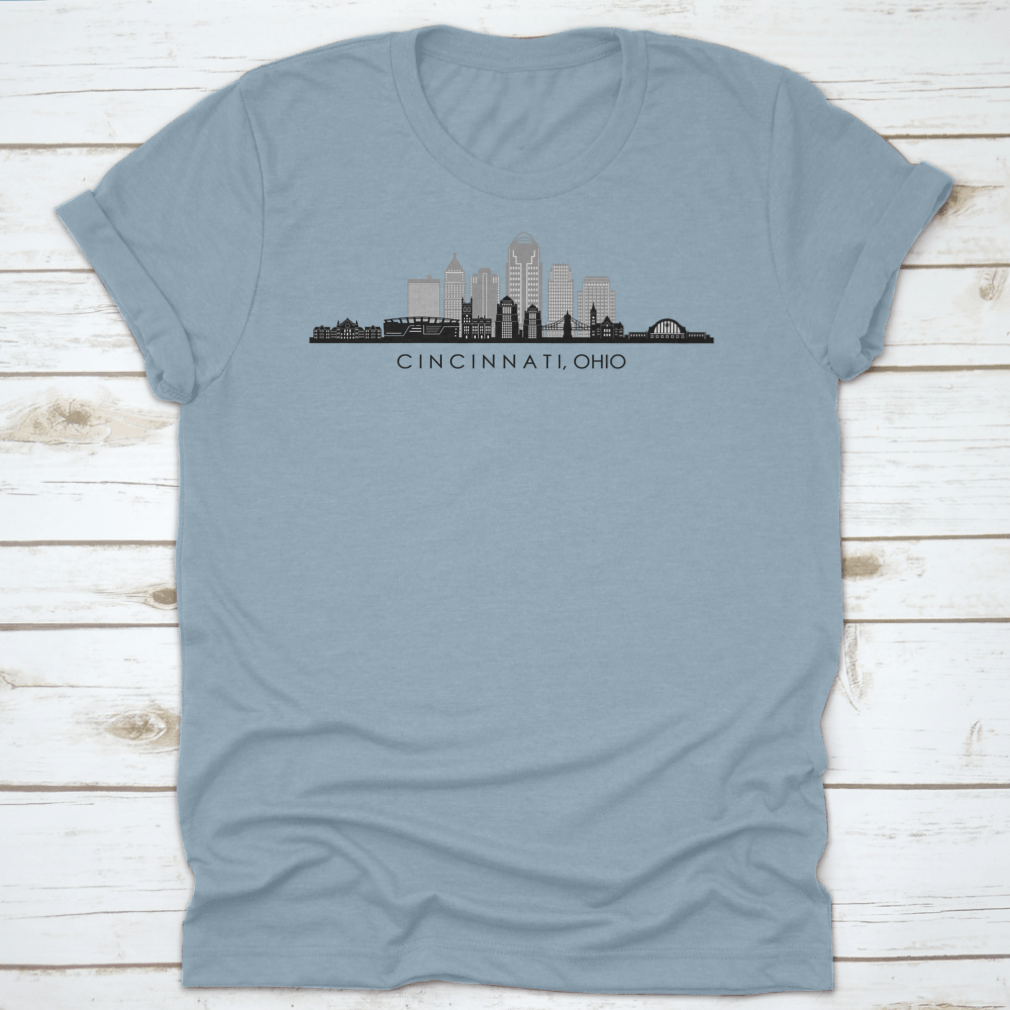 A modern t-shirt featuring the skyline silhouette of Cincinnati, Ohio, showcasing iconic buildings in a stylish design.