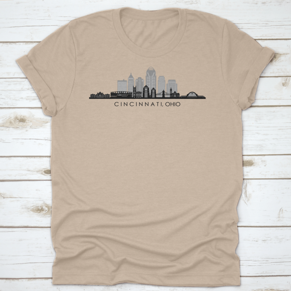 A modern t-shirt featuring the skyline silhouette of Cincinnati, Ohio, showcasing iconic buildings in a stylish design.