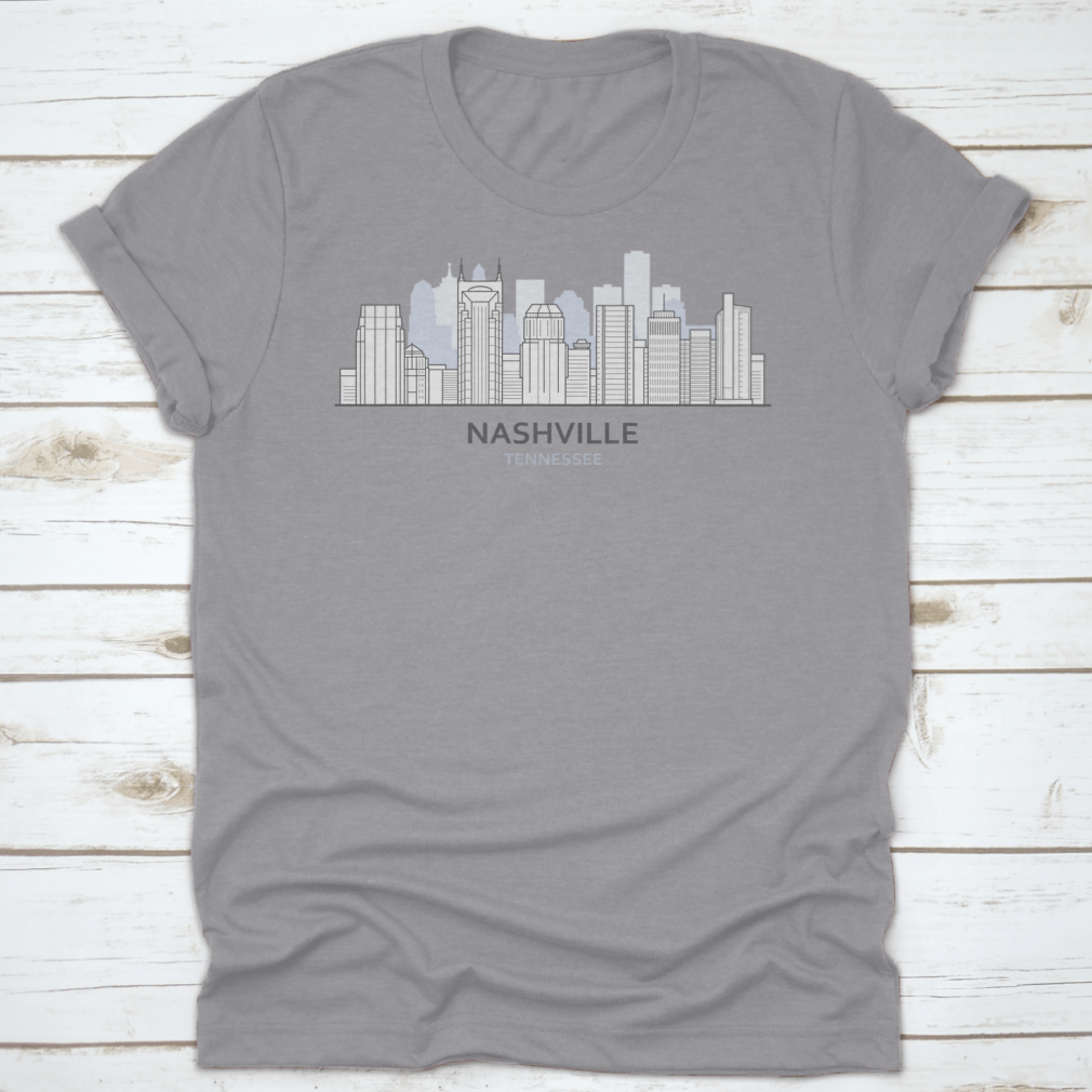 A stylish T-shirt featuring a line art design of the Nashville, Tennessee skyline, showcasing iconic buildings and structures.