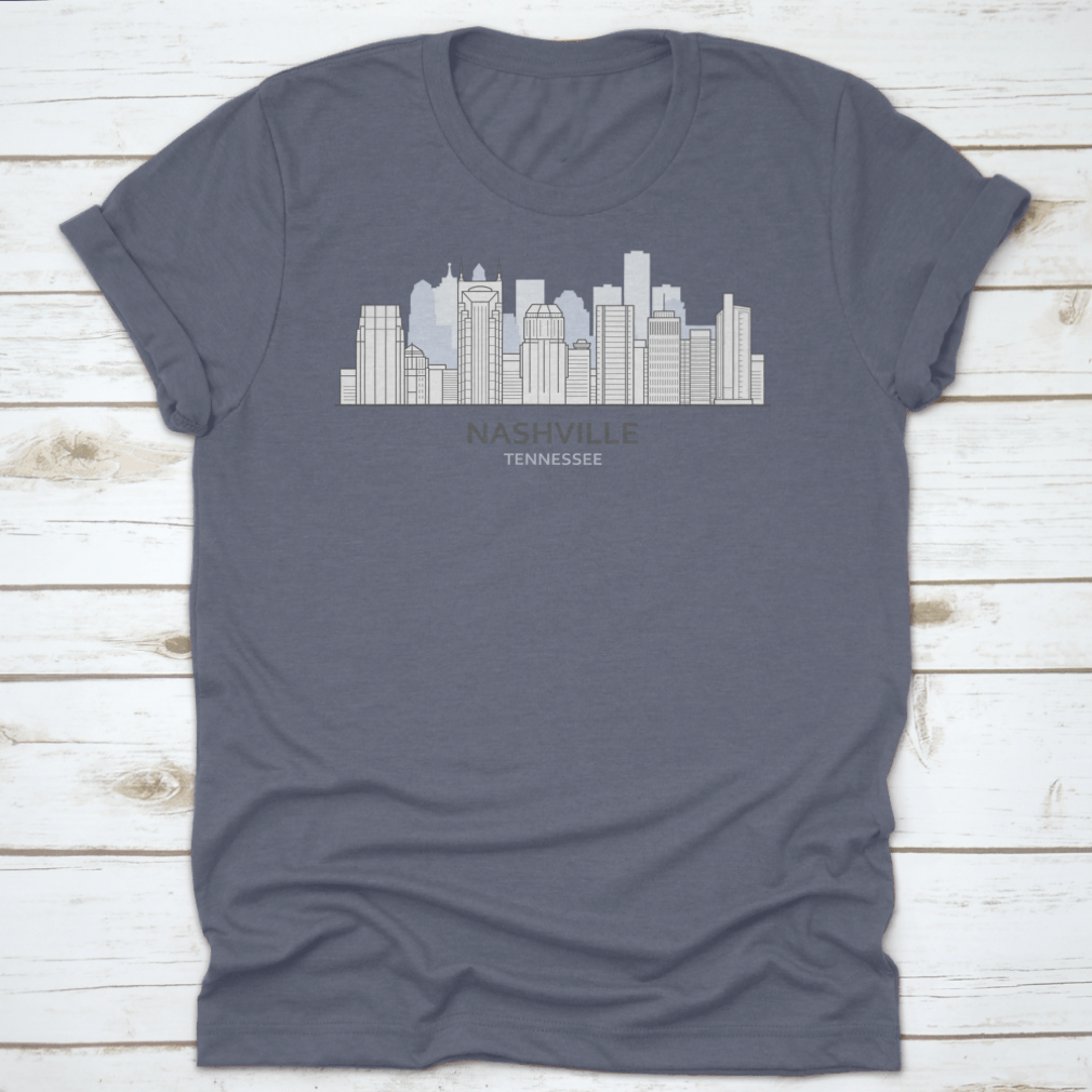 A stylish T-shirt featuring a line art design of the Nashville, Tennessee skyline, showcasing iconic buildings and structures.