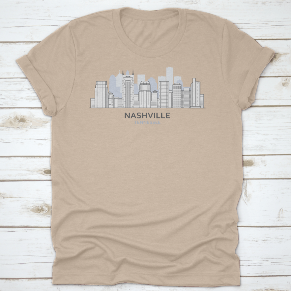A stylish T-shirt featuring a line art design of the Nashville, Tennessee skyline, showcasing iconic buildings and structures.