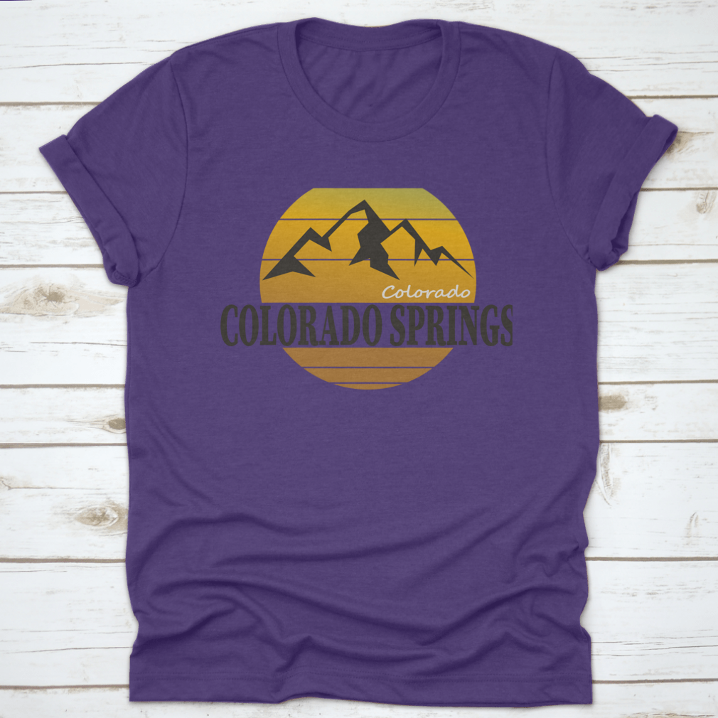 A comfortable Colorado Springs Colorado Tourism T-shirt displayed on a wooden background, showcasing its classic fit and quality fabric.