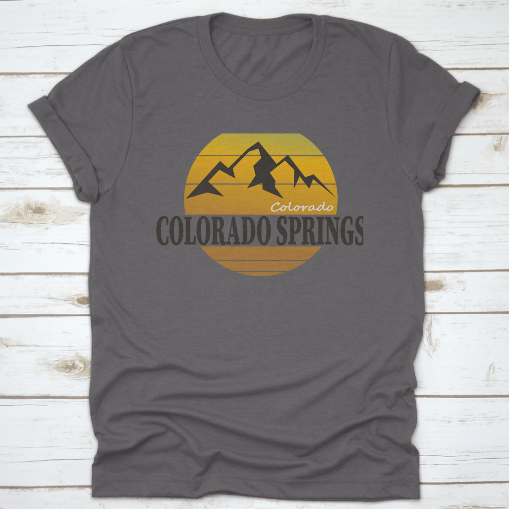 A comfortable Colorado Springs Colorado Tourism T-shirt displayed on a wooden background, showcasing its classic fit and quality fabric.