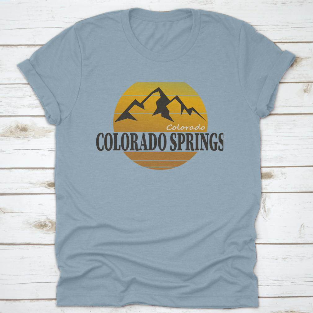 A comfortable Colorado Springs Colorado Tourism T-shirt displayed on a wooden background, showcasing its classic fit and quality fabric.