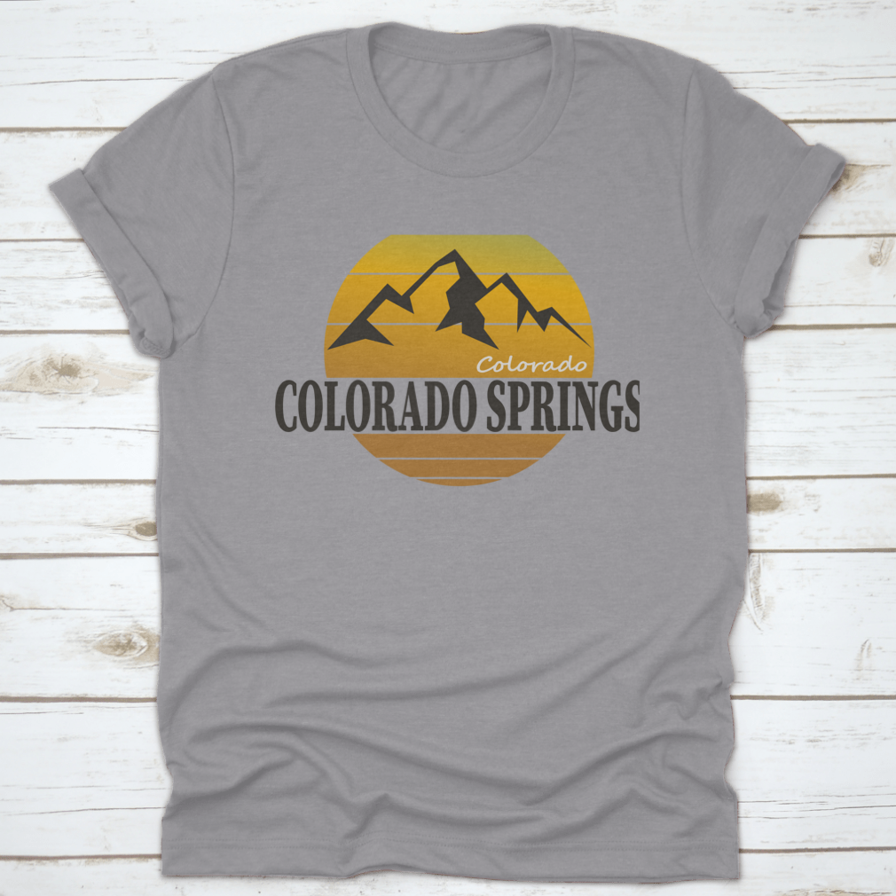 A comfortable Colorado Springs Colorado Tourism T-shirt displayed on a wooden background, showcasing its classic fit and quality fabric.
