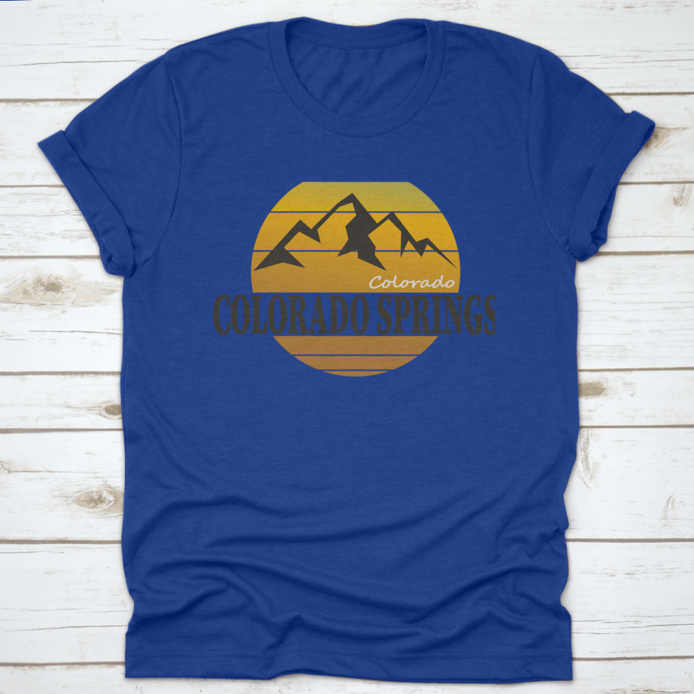 A comfortable Colorado Springs Colorado Tourism T-shirt displayed on a wooden background, showcasing its classic fit and quality fabric.
