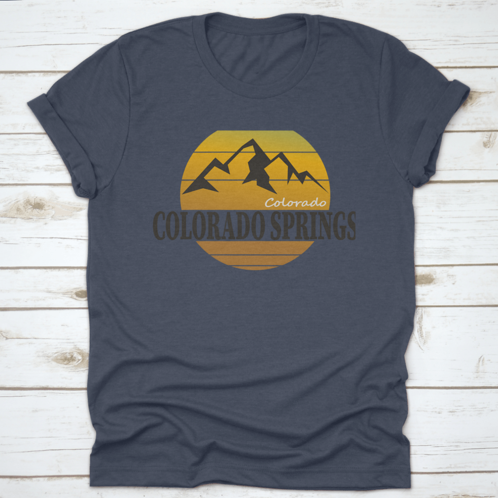 A comfortable Colorado Springs Colorado Tourism T-shirt displayed on a wooden background, showcasing its classic fit and quality fabric.