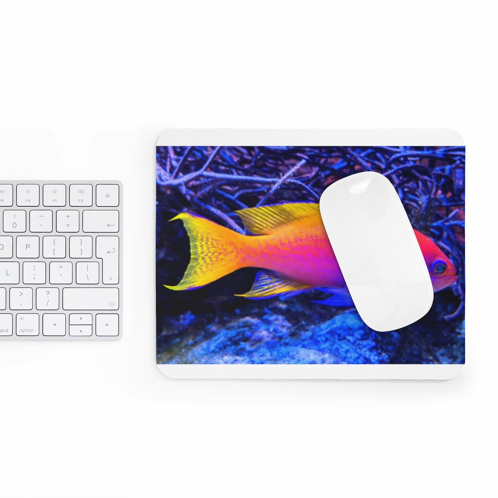 Colored Fish Mouse Pad featuring vibrant fish design on a smooth surface, ideal for enhancing desk decor.