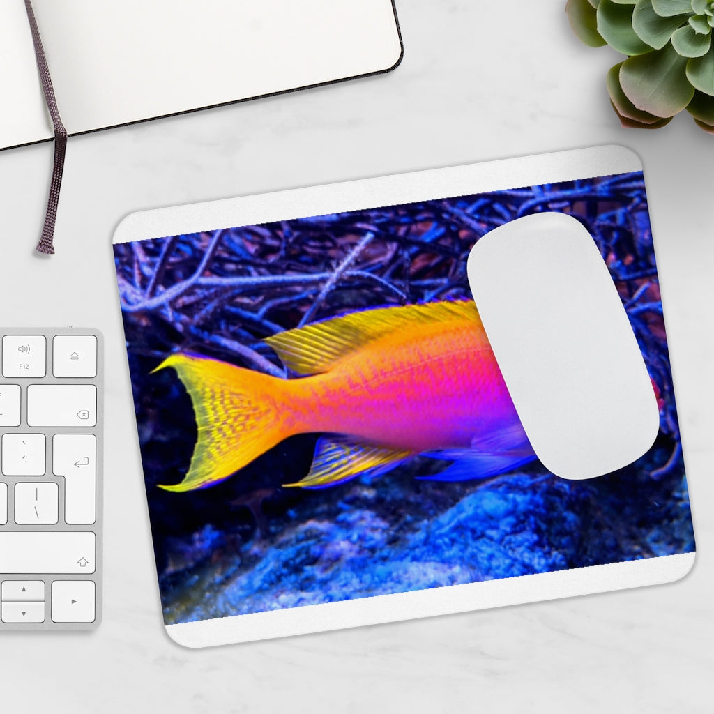 Colored Fish Mouse Pad featuring vibrant fish design on a smooth surface, ideal for enhancing desk decor.