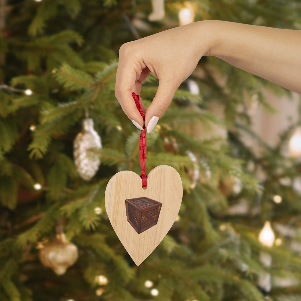 A collection of Crate Wooden Christmas Ornaments in various whimsical shapes, featuring a rustic wood finish and red ribbons for hanging.