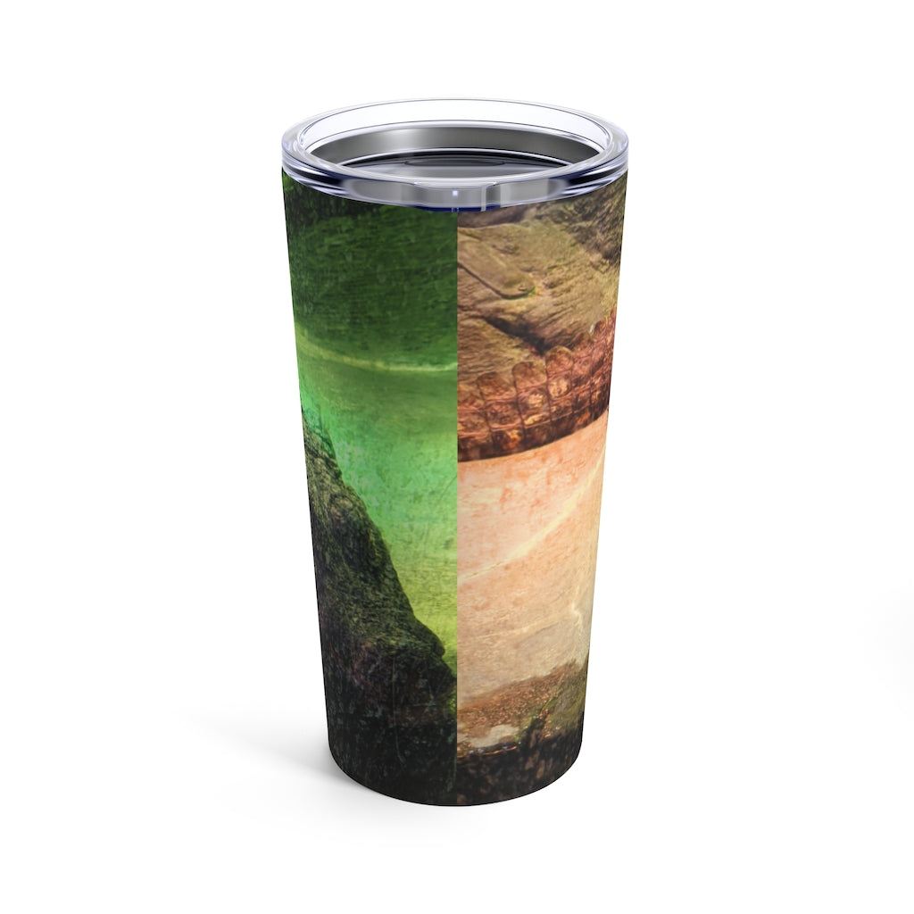 Crocodile Tumbler 20oz in stainless steel with a see-thru plastic lid, showcasing its sleek design and rounded corners.