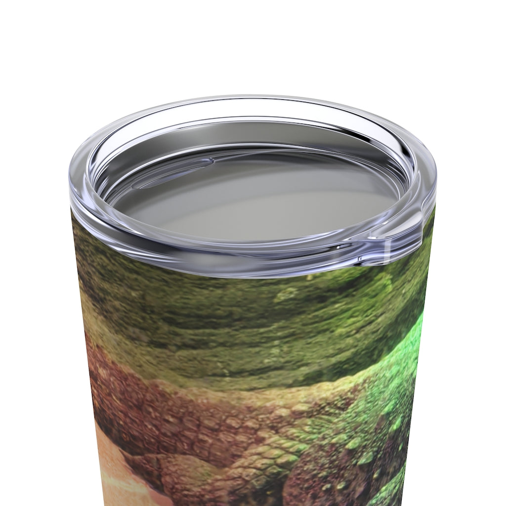 Crocodile Tumbler 20oz in stainless steel with a see-thru plastic lid, showcasing its sleek design and rounded corners.