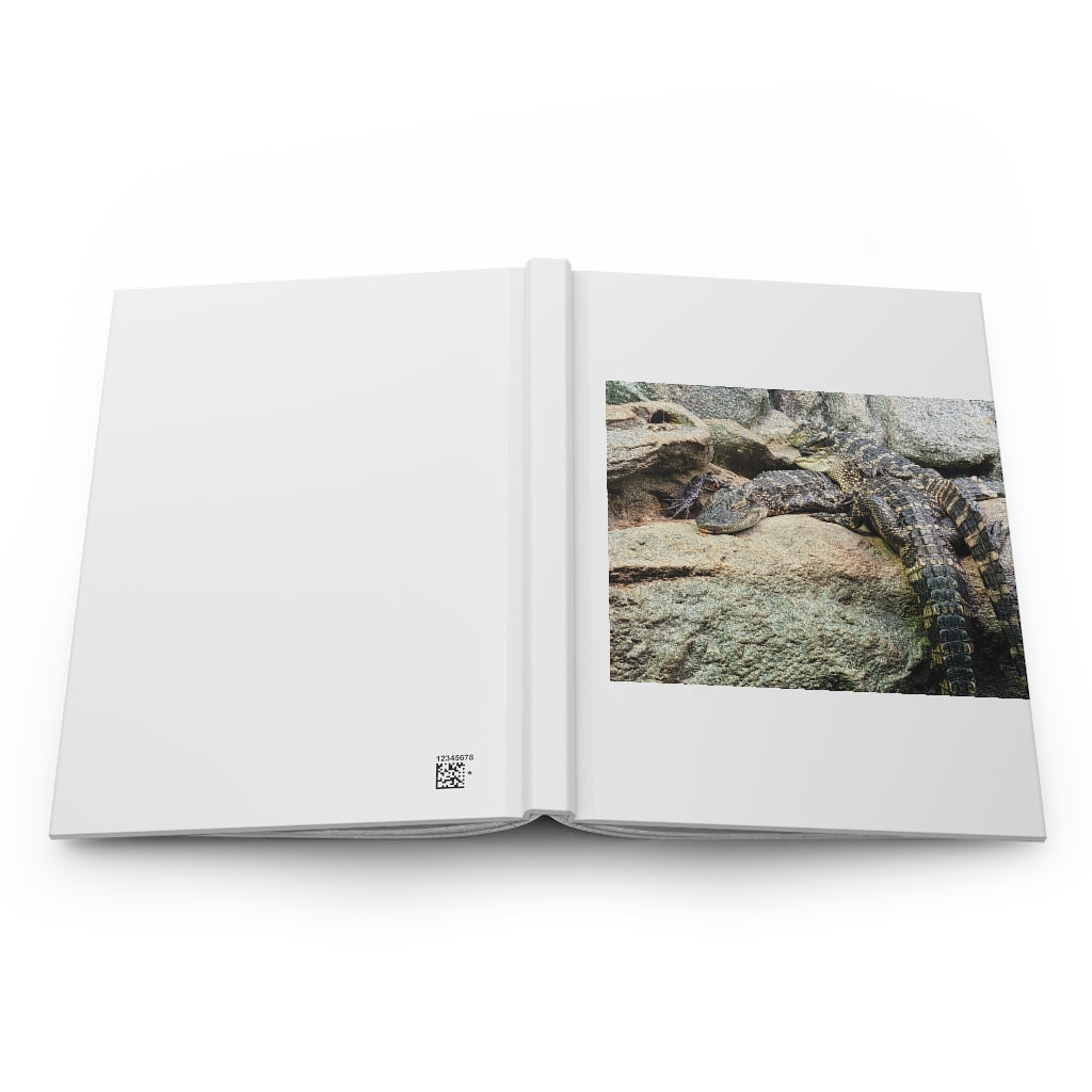 Crocodiles Hardcover Journal with matte finish and customizable covers, featuring lined pages for writing.