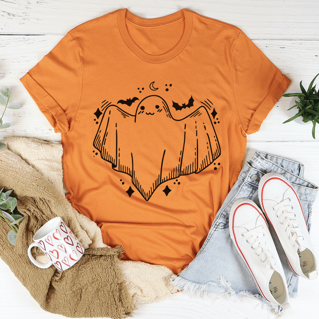 A cute little ghost graphic on a soft cotton Halloween tee, perfect for festive celebrations.